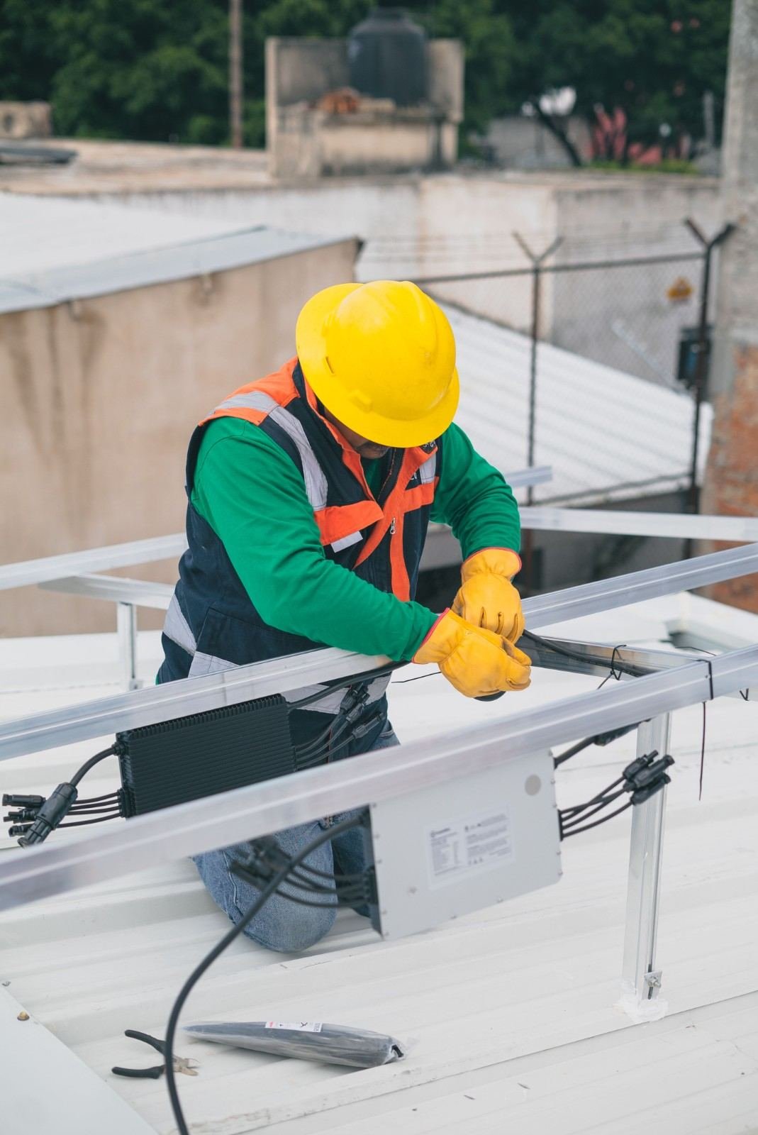 Electrical technician working on power equipment in West Palm Beach, FL