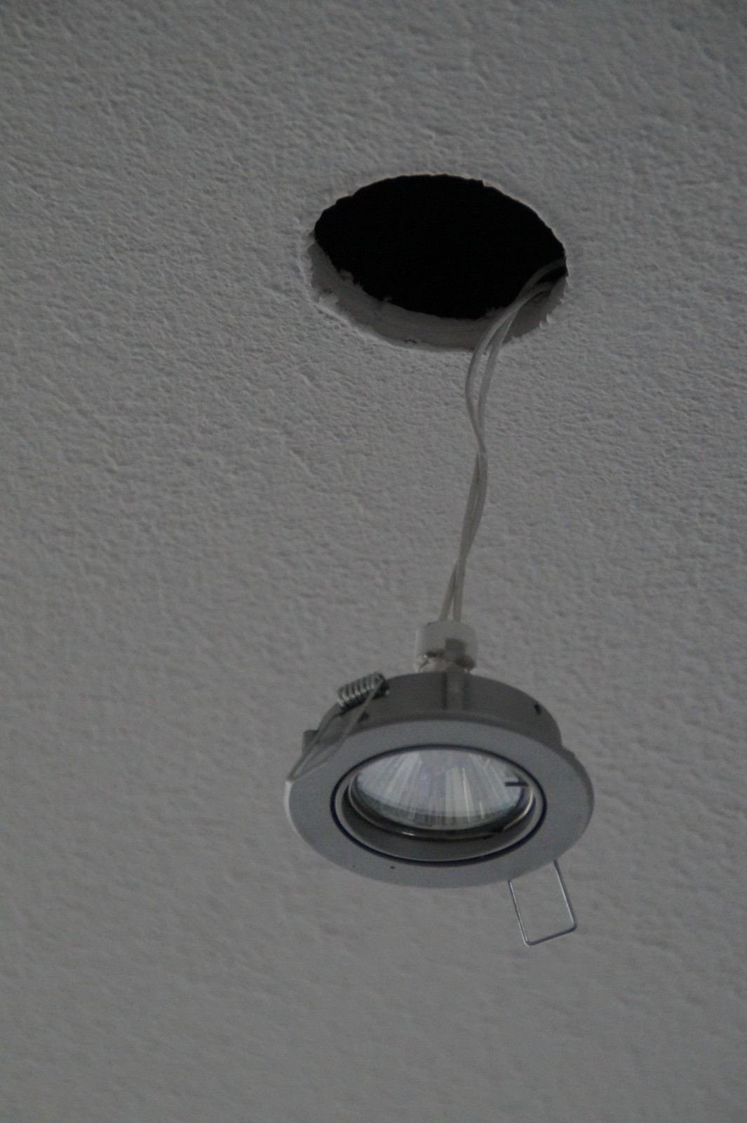 Recessed ceiling light fixture with exposed wiring during installation in West Palm Beach, FL